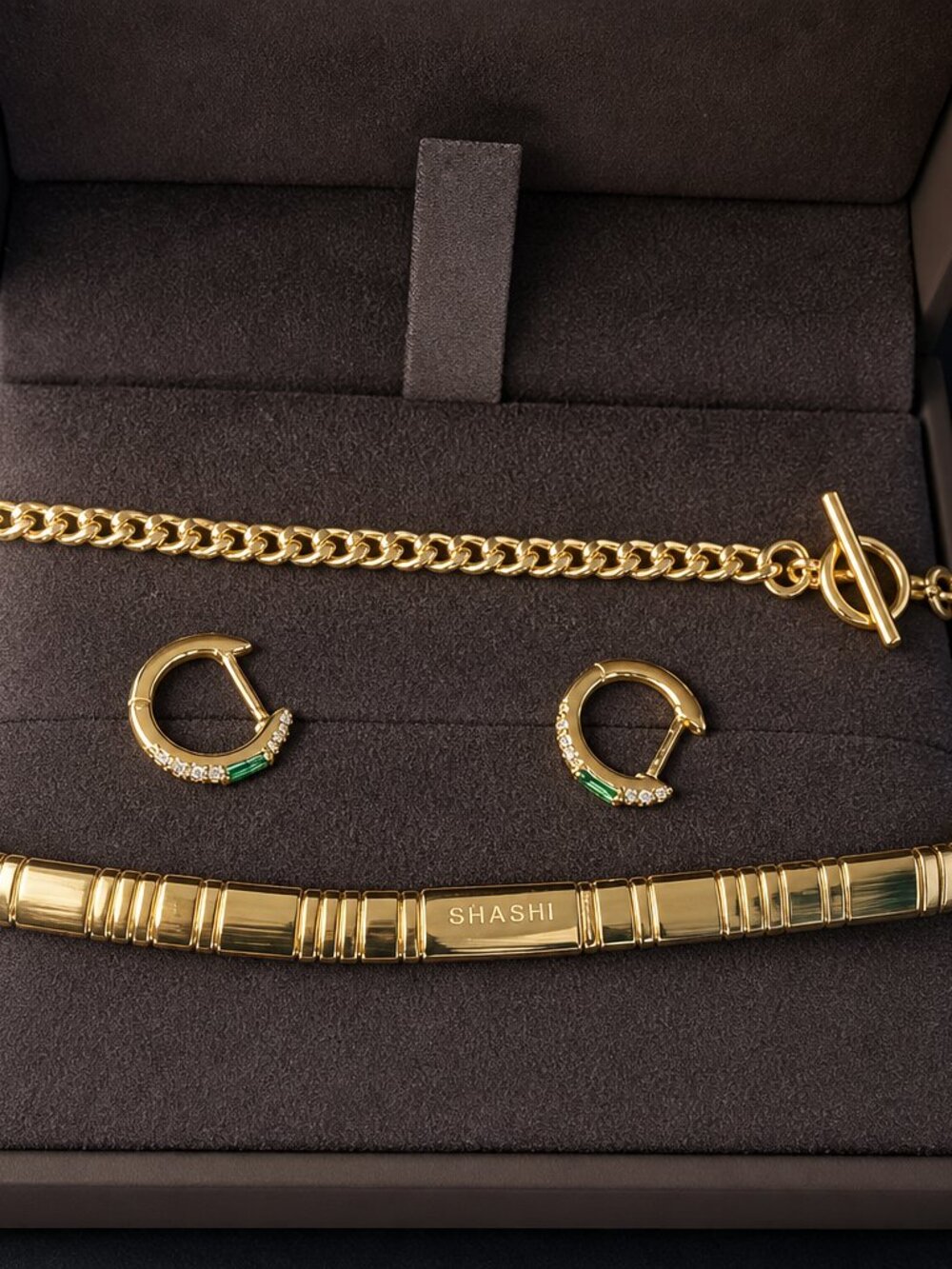 3 item Shashi Bundle Gold Bracelets and Gold Emerald Earring Cuffs